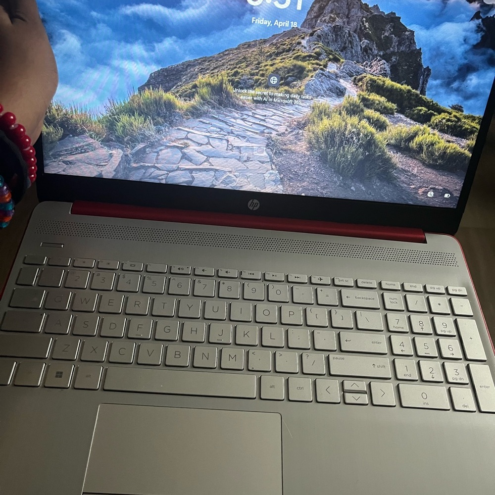 HP Silver Laptop with Red Accents